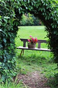 A Basket Of Pink Flowers on a Bench in the Garden Spring Journal