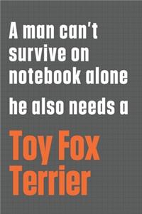 A man can't survive on notebook alone he also needs a Toy Fox Terrier