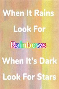 When It Rains Look For Rainbows When It's Dark Look For Stars