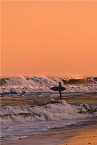 Surfer in the Waves at Sunset