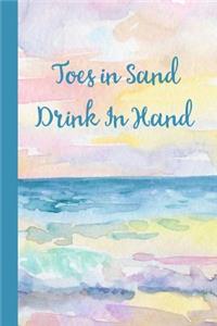 Toes in Sand Drink In Hand