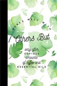 Works Well With Others But Only After Copious Amounts of Coffee & Essential Oils