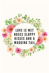 Love is wet noses sloppy kisses and a wagging tail