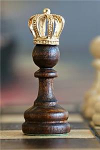 A Golden Crowned Chess Piece Journal