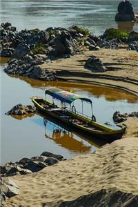 Boat on the Mekong River in Vietnam Journal