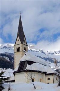 Snow Covered Church in The Dolomites Mountains of Italy Journal