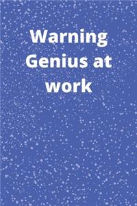 Warning Genius at work