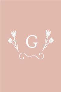 G: Monogram initial medium-lined notebook. Pink and white diary.