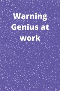 Warning Genius at work