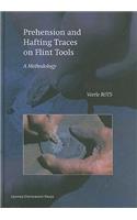 Prehension and Hafting Traces on Flint Tools