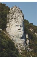 Decebalus Rock Sculpture in Romania Journal: 150 page lined notebook/diary