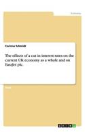The effects of a cut in interest rates on the current UK economy as a whole and on EaszJet plc.