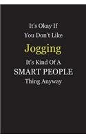It's Okay If You Don't Like Jogging It's Kind Of A Smart People Thing Anyway: Blank Lined Notebook Journal Gift Idea With Black Cover Background, White and Yellow Text