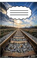 Notizbuch mit Eisenbahnschienen
