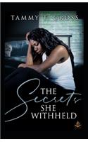 The Secrets She Withheld