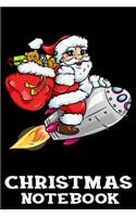 Christmas Notebook: Funny Santa Claus On A Rocket With A Toy Bag Christmas Journal Book - Lined Paper Notebook for Writing and Doodling