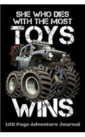 She Who Dies With The Most Toys Wins