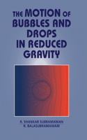 Motion of Bubbles and Drops in Reduced Gravity