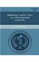 Modeling Traffic Flow on Oversaturated Arterials