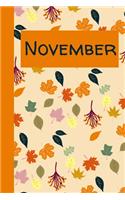 November: Monthly Journal / Lined Notebook A Month / Multi Colored Autumn Leaves Background