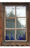 Blue Bottles on a Wooden Windowsill Journal