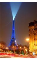 Eiffel Tower Lit Up in Blue Journal: Take Notes, Write Down Memories in this 150 Page Lined Journal