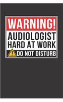 Warning Audiologist Hard At Work