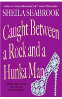 Caught Between a Rock and a Hunka Man