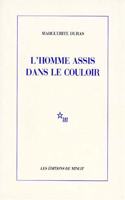 L' Homme Assis Dans Le Couloir