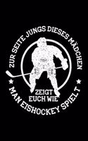 ZUR SEITE JUNGS DIESES MÄDCHEN ZEIGT EUCH WIE MAN EISHOCKEY SPIELT Notizbuch