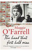 The Hand That First Held Mine