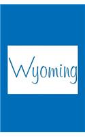 Wyoming - Cobalt Blue Lined Notebook with Margins: 101 Pages, Medium Ruled, 6 x 9 Journal, Soft Cover