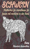Malbücher für Erwachsene für Frauen mit Markern in der Hand - Mandala Stressabbau - Tiere - Schwein