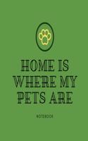 Home is where my pets are notebook: Green paw print lined paperback jotter