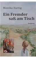 Ein Fremder sa� am Tisch