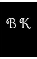 B K