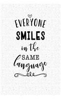 Everyone Smiles in the Same Language: A 6x9 Inch Matte Softcover Notebook Journal with 120 Blank Lined Pages and an Uplifting Cover Slogan