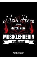 Mein Herz wurde durch eine Musiklehrerin entflammt: A5 Notizbuch - Liniert 120 Seiten - Geschenk/Geschenkidee zum Geburtstag - Weihnachten - Ostern - Vatertag - Muttertag - Namenstag