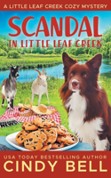 Scandal in Little Leaf Creek: (14 A Little Leaf Creek Cozy Mystery)