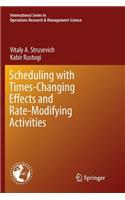 Scheduling with Time-Changing Effects and Rate-Modifying Activities