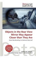Objects in the Rear View Mirror May Appear Closer Than They Are: (English)