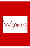 Wyoming - Red Lined Notebook with Margins: 101 Pages, Medium Ruled, 6 x 9 Journal, Soft Cover