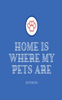 Home is where my pets are notebook: Blue paw print lined paperback jotter