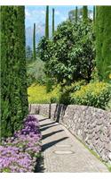A Charming Path Through a European Garden in the Summertime Journal