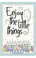 Enjoy the little things motivational quote on cute cover to start a happy new year with joy and fun