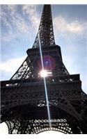 Sunlight Through the Eiffel Tower Paris France Travel Journal: 150 Page Lined Notebook/Diary