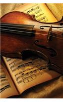 Violin and Music Notebook