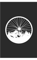 Bicycle Wheel With Mountain And Forest Silhouette: Cycle Sport Notebook, Blank Lined (6" x 9" - 120 pages) Sports Themed Notebook for Daily Journal, Diary, and Gift