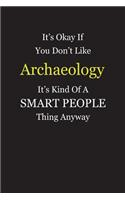 It's Okay If You Don't Like Archaeology It's Kind Of A Smart People Thing Anyway: Blank Lined Notebook Journal Gift Idea With Black Cover Background, White and Yellow Text