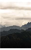 Moody Alpine Landscape with Mountains and Clouds Journal